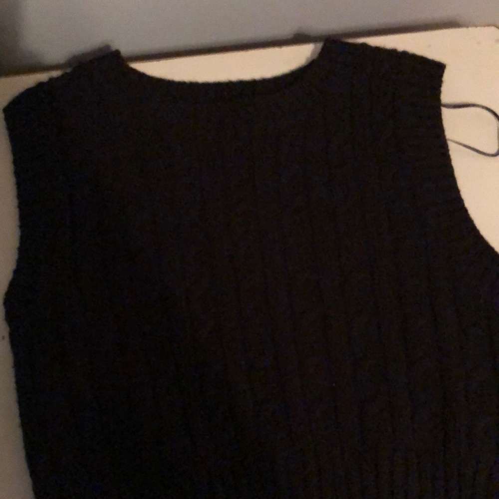 Black vest ,small,never worn,